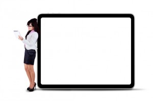 Businesswoman using digital tablet with copyspace